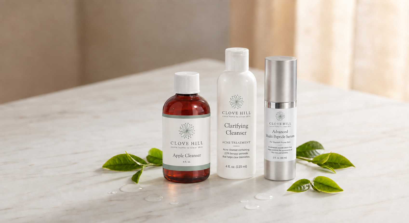 Clove Hill acne care products on a softly lit marble surface